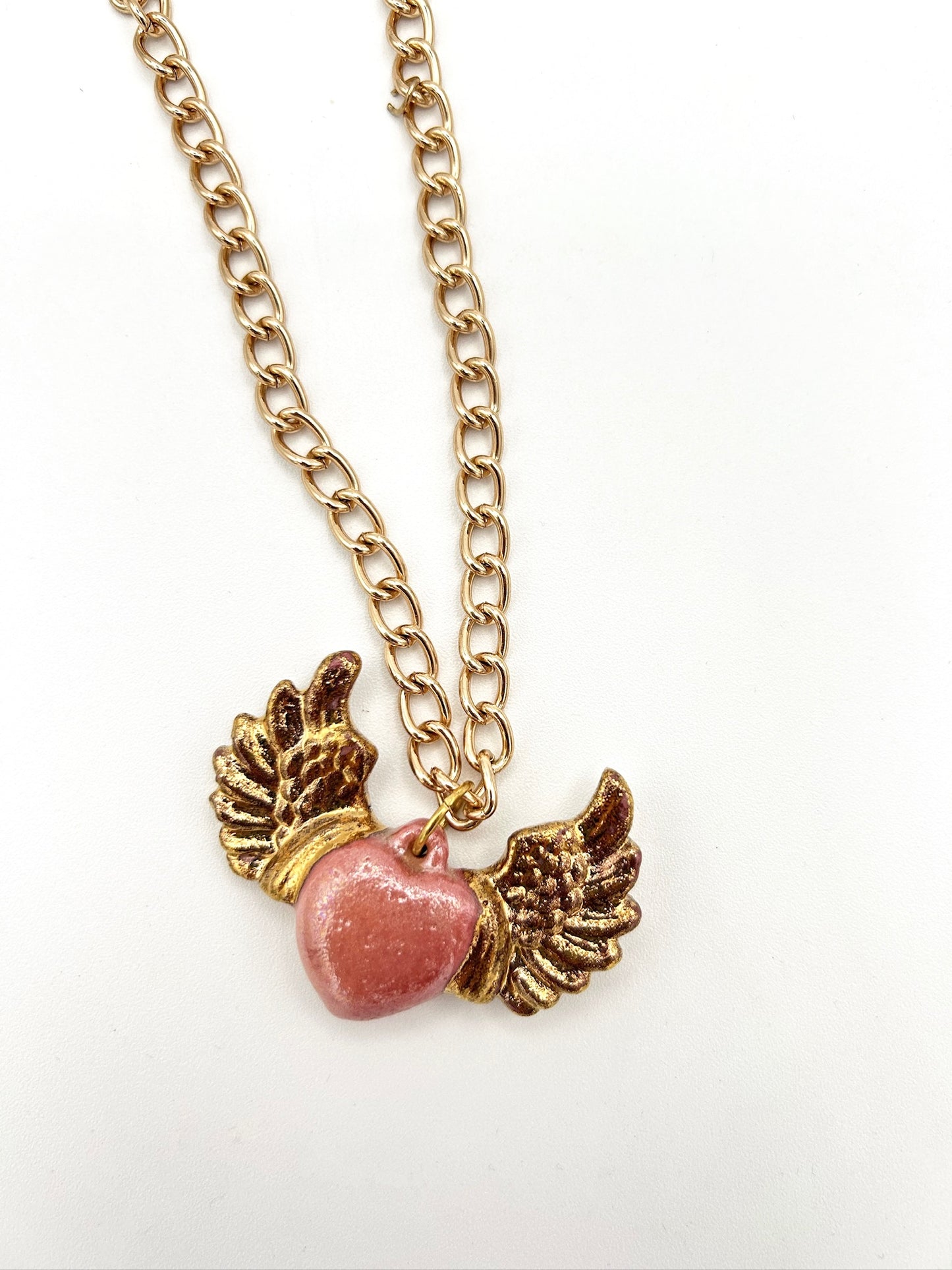Winged heart necklace