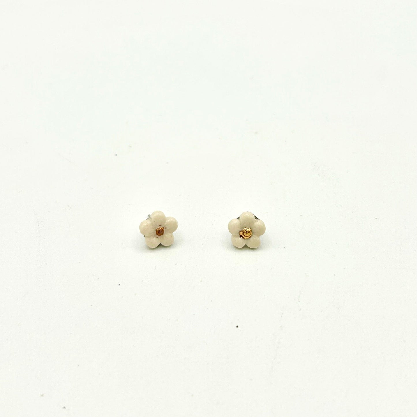 Teeny tiny pansy studs
