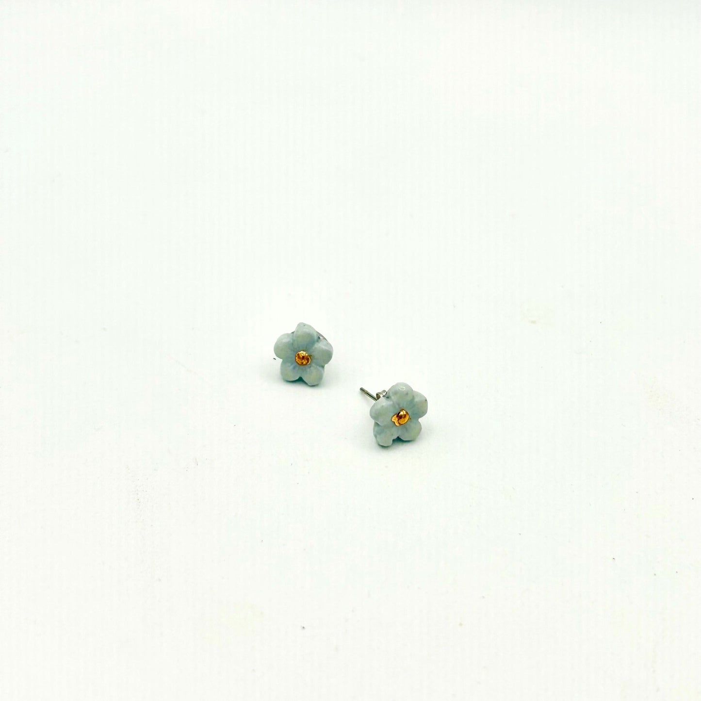 Teeny tiny pansy studs