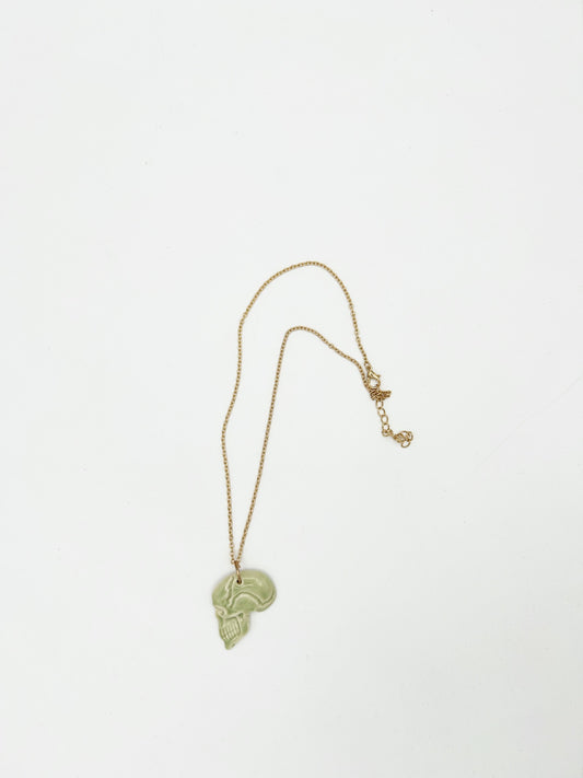 Skull profile necklace