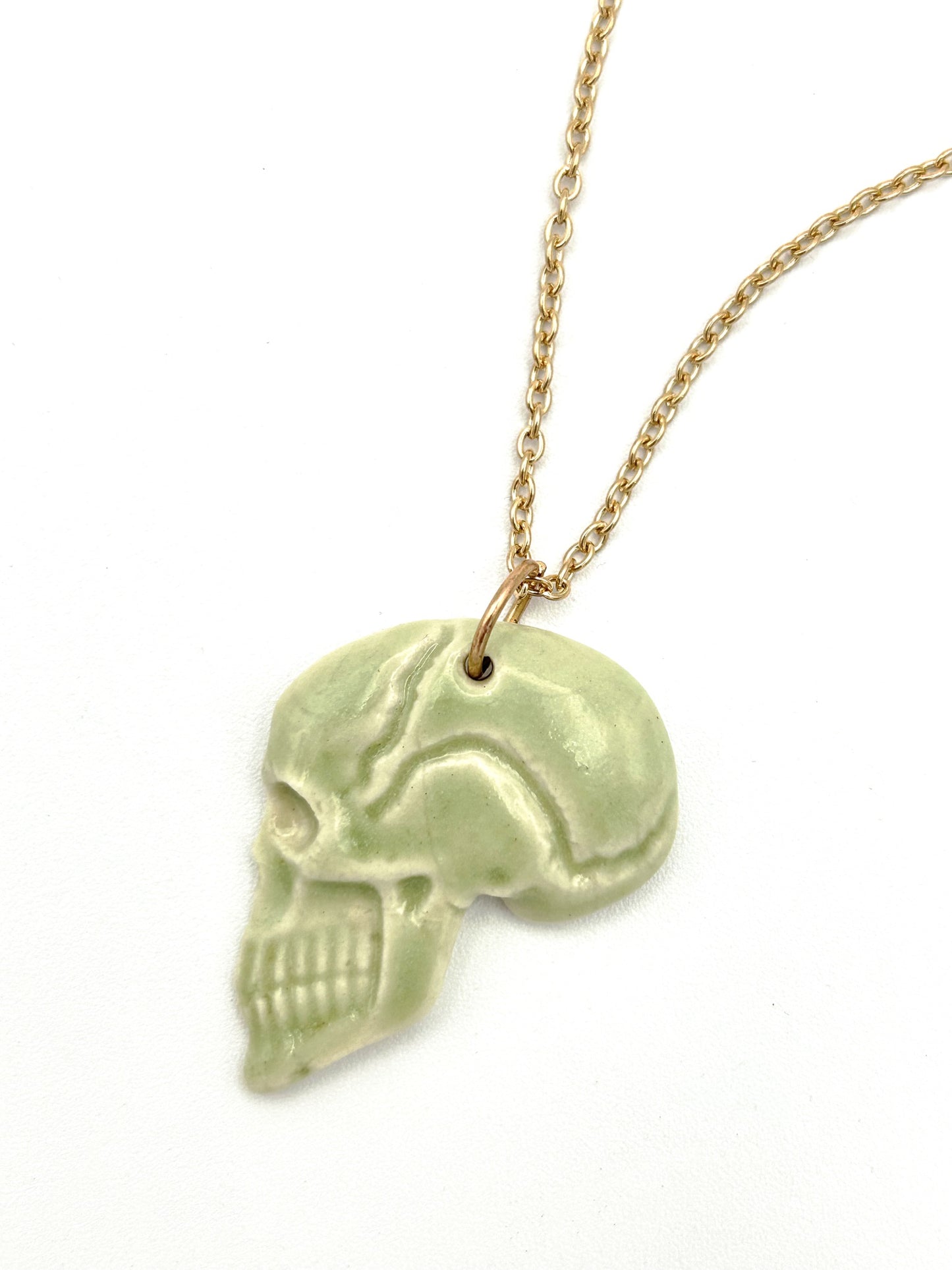 Skull profile necklace