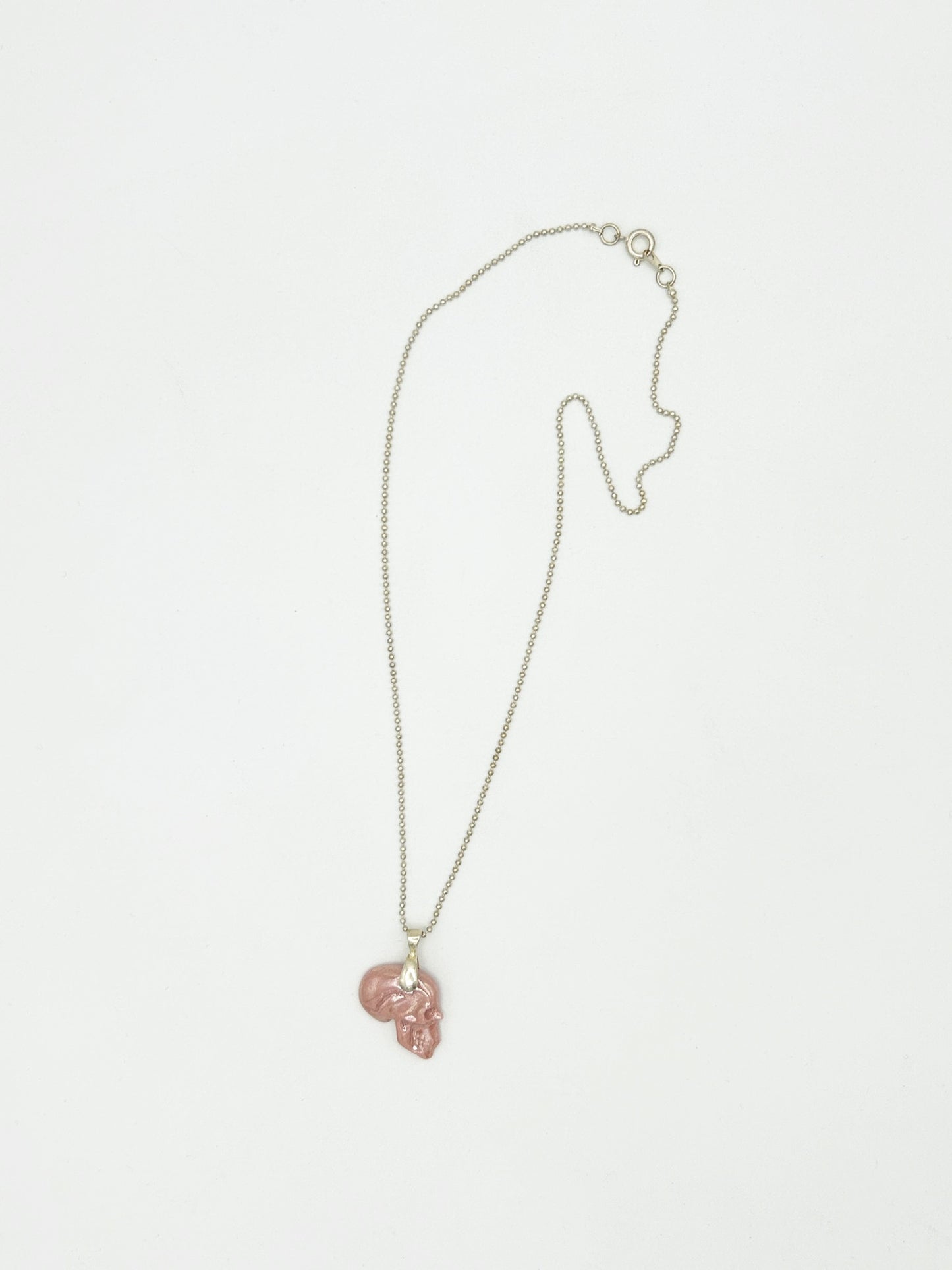 Skull profile necklace